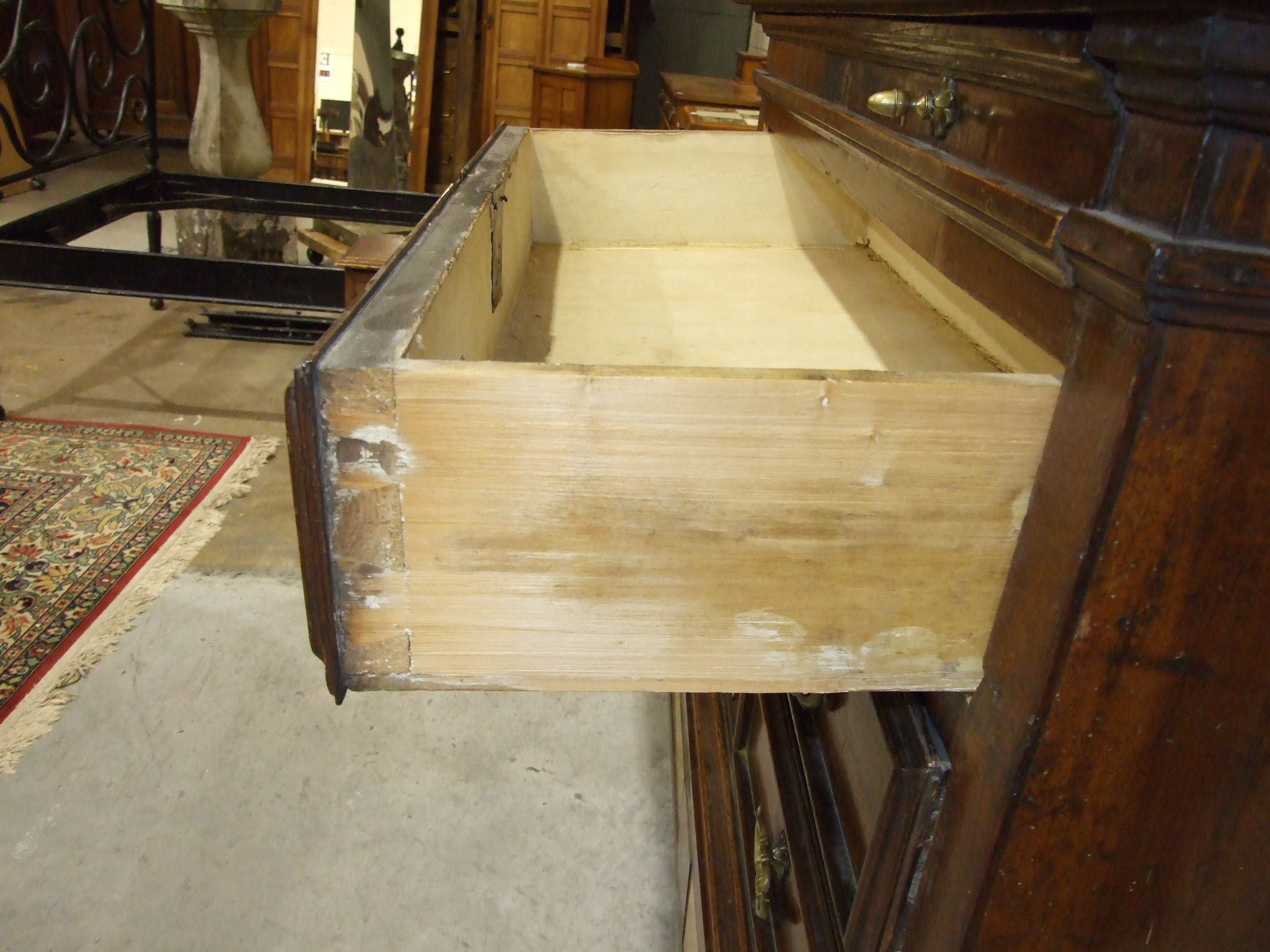 An 18th century Italian chest, the purple marble top (cracked) above a shallow frieze drawer and - Image 5 of 8