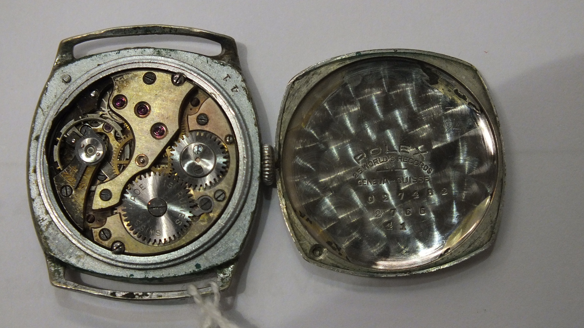 Rolex, a steel-cased cushion-shaped wrist watch c1930's with Arabic numerals and seconds subsidiary, - Image 5 of 5