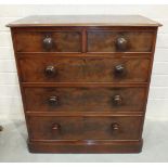 A Victorian small mahogany chest of two short and three long cockbeaded drawers, on plinth base,