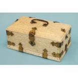 An early-20th century carved ivory and gilt-metal-bound casket carved with overall foliate design,