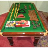 An early-20th century mahogany slate-bed quarter-size snooker table/dining table, with rise and fall