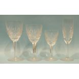 A part-suite of heavy cut-glass drinking glasses: six large wine glasses, six small wine glasses,