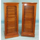 A pair of early-20th century lepidopterist's cabinets, each with glazed door enclosing twenty