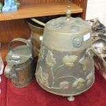 A late 19th/early 20th century Dutch copper and brass ash carrier with applied leaf and lion mask