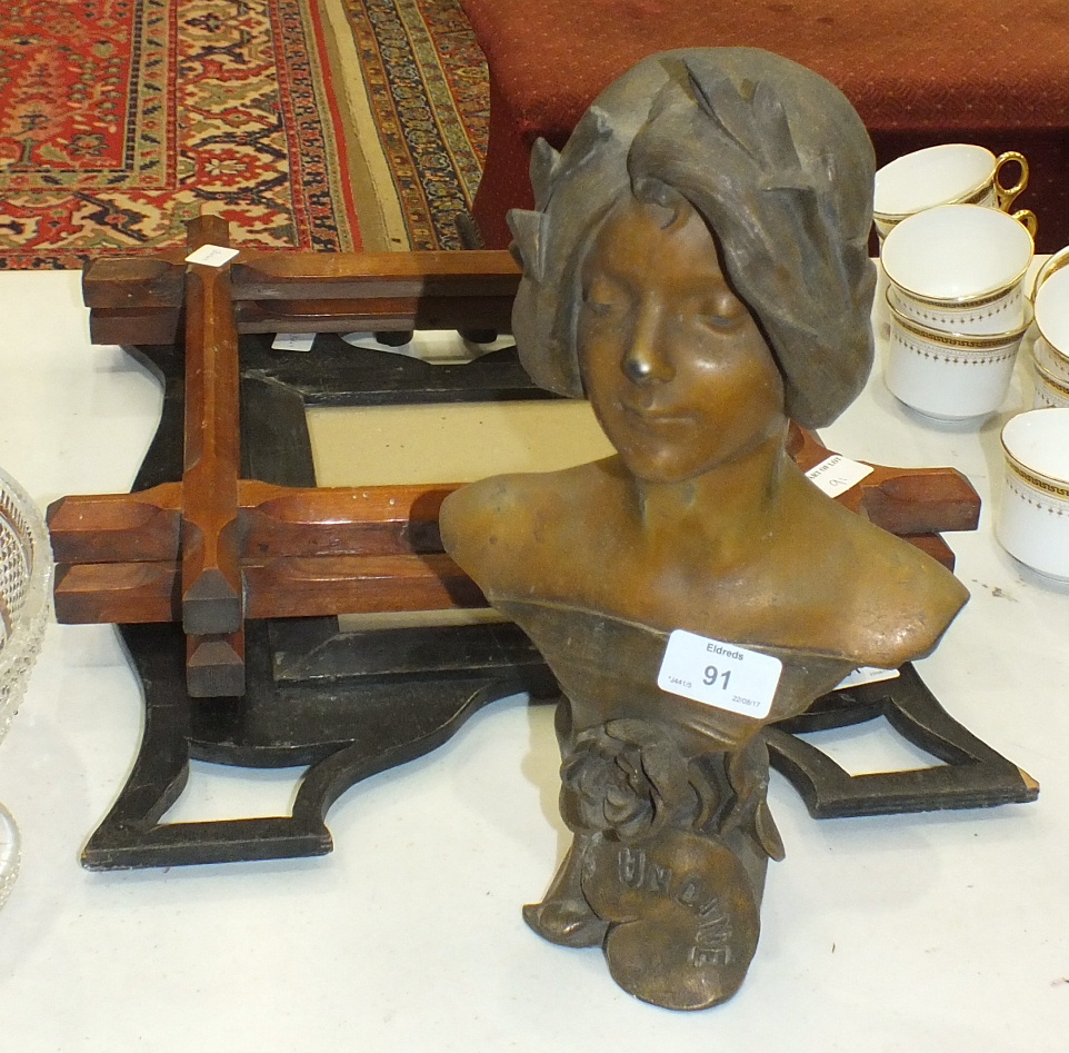A bronzed metal bust of Undine, a pair of pitch pine photo frames and an ebonised frame.