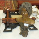 A bronzed metal bust of Undine, a pair of pitch pine photo frames and an ebonised frame.