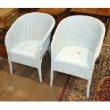 A pair of Lloyd Loom bedroom armchairs.