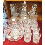 Four various glass decanters and stoppers, six whisky glasses and other cut-glass items.