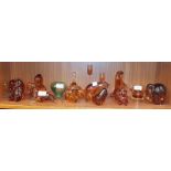 Ten Wedgwood amber glass animal paperweights, including two elephants, squirrel, Scottie dog,