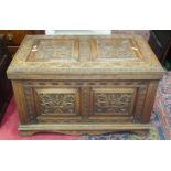 A 20th century carved oak blanket box, 91cm wide.