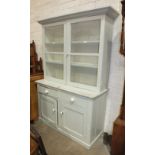 A late 19th century painted pine dresser, the upper shelves fitted with a pair of glazed doors above