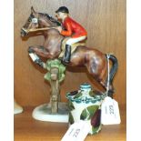 A Wemyss preserve pot decorated with plums, 7cm high and a Goebel figure of a rider and hose jumping