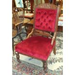 An Edwardian walnut partially upholstered salon chair.