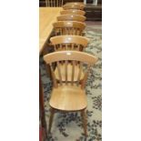 Five modern beech lathe back dining arm chairs and two single chairs, (7).