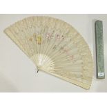 A 19th century fan with bone sticks and guards and gauze leaf, and a quantity of costume jewellery.