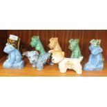 Seven SylvaC dog ornaments, no.1578 x 4 ((3 green/brown, fawn), no.1122 x 2 (blue/brown, cream/