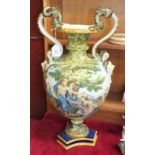 A 20th century Ginori ceramic baluster vase flamboyantly-painted with classical and landscape