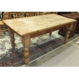 A pine farmhouse kitchen table on turned legs, 92 x 183cm.