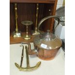 A pair of brass candlesticks, 30.5cm high, a copper kettle and coal helmet, a small wood framed harp