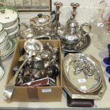 A three-piece silver-plated tea service, two entrée dishes, cutlery and other plated ware.