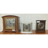An Elliott walnut cased Westminster/Whittington chiming mantel clock, 23cm high, an Elliott white