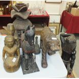 Various Asian and African wood carvings, figures, horses and other items.