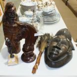 A 20th century carved wood fly whisk, a modern African face mask, a carved wood horse's head chess