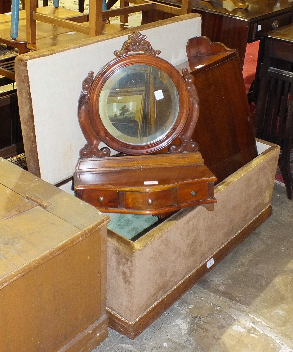 An upholstered oak Ottoman box, 87cm long, a single-door mahogany medicine cupboard, 65cm high, 41cm