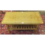 A craftsman-made oak two-tier coffee table, the rectangular inlaid top on chamfered square legs