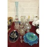 A pair of glass ships decanters with stoppers and faceted decoration, 22cm high, other decanters,