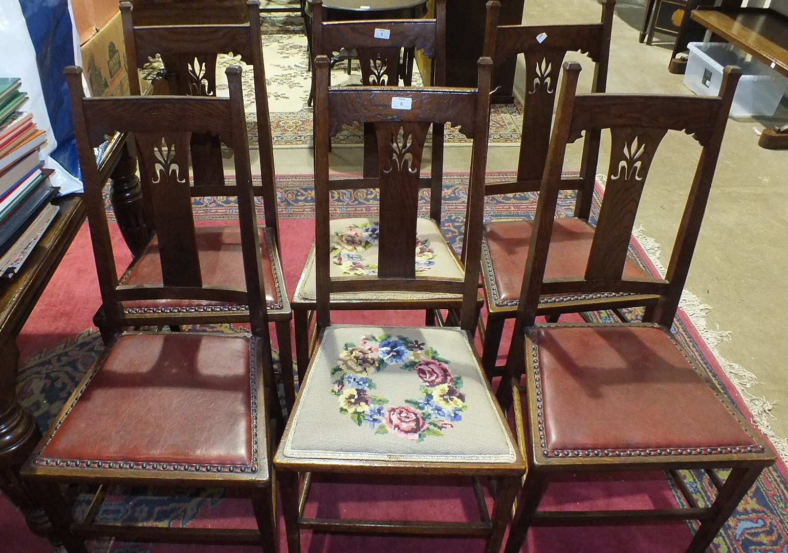 A set of six oak framed dining chairs with centre splats and padded seats on square tapering front - Image 2 of 2