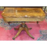 An early-19th century mahogany fold-over card table, (top split), on quadruped base, 94cm wide.