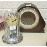 A Violeta chrome finish 400-day clock under a glass dome, 23cm high overall and a Smiths oak-cased