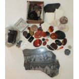 A quantity of polished agate plaques, beads, pendants, etc. and other hard stones.