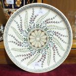 A Zsolnay floral-decorated plate, 28cm diameter.