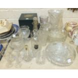 A collection of cut and other glassware, including vases, decanters, bowls, wine and drinking