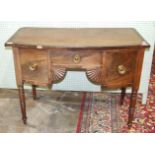 A Georgian small mahogany sideboard, the slightly-bowed top above a central drawer, flanked by a