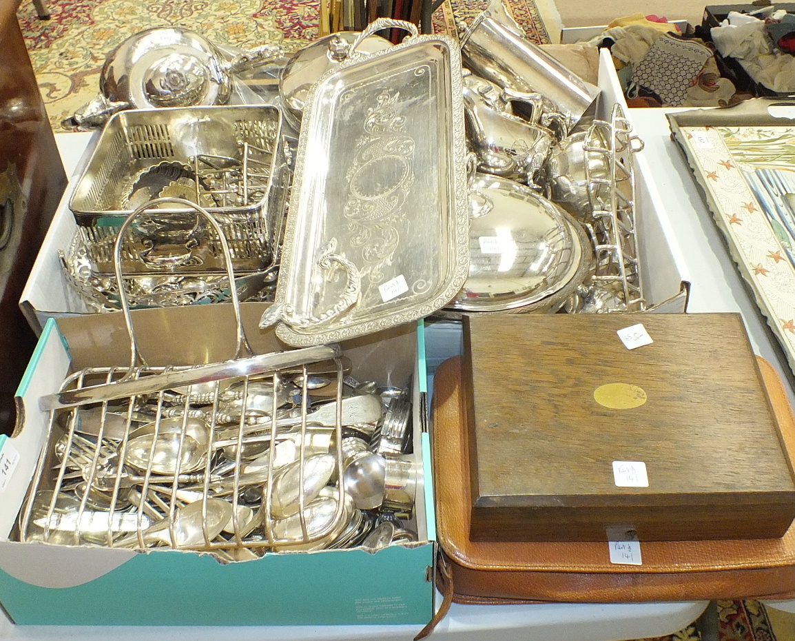 A quantity of plated cutlery, various plated teapots, condiment items and other plated ware.