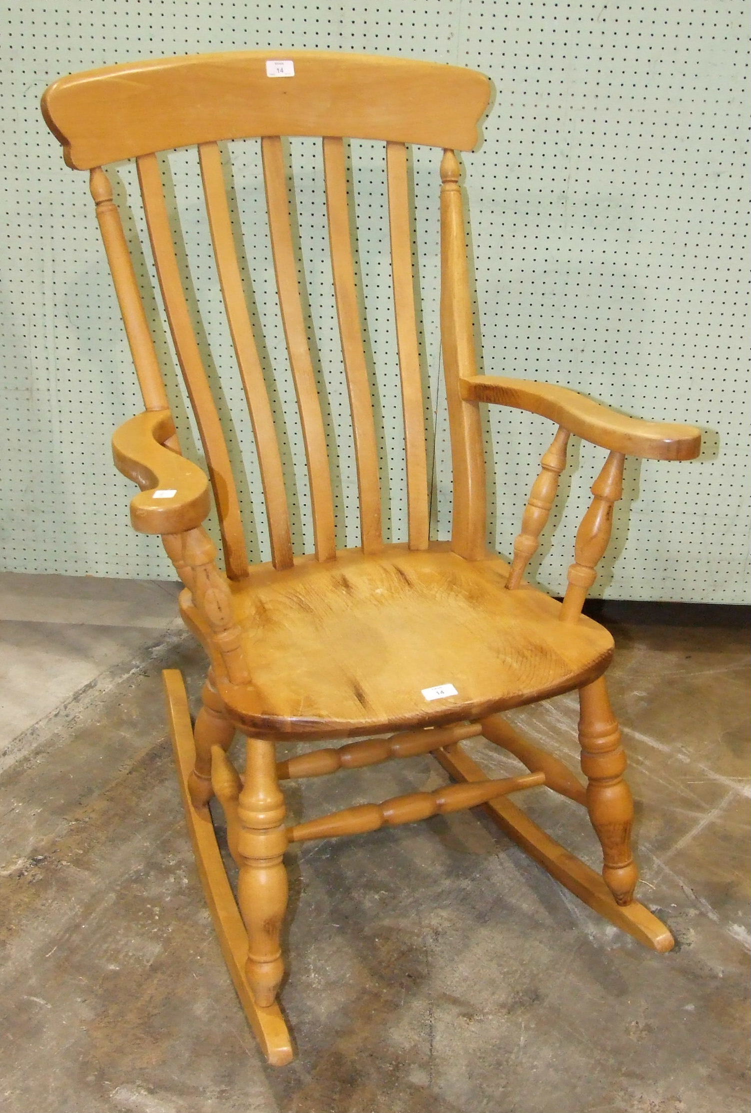 A modern pine rocking chair.