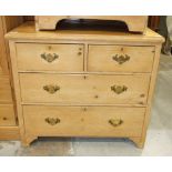A stripped pine straight-front chest of two short and two long drawers, 90cm wide, 82cm high.