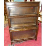 A 'Gunn' oak three-section bookcase in the Globe Wernicke style, 87cm wide, 127cm high.