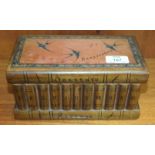 A Sorrento olive wood puzzle box of typical book form, 23cm wide, 12cm deep, 11cm high, a small