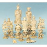 A collection of twelve early-19th century white ivory chess pieces, including King, 14cm high, Queen