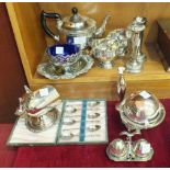 A Viners of Sheffield three-piece plated tea service, other plated ware and a pair of silver sugar