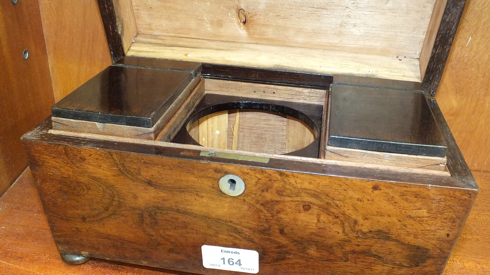 A 19th century rosewood tea caddy of sarcophagus shape, the interior with two containers and - Image 2 of 2