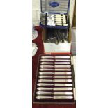 A cased set of twelve Elkington silver-handled tea knives and a small quantity of other plated