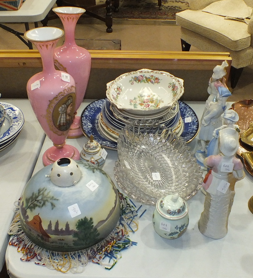 A pair of late-19th century Continental pink glass vases of baluster form with tapering neck and