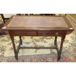 An Edwardian stained hardwood writing table, the rectangular top with leather inset above two