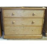 A stripped pine straight-front chest of three drawers on plinth base, 106cm wide, 85cm high.