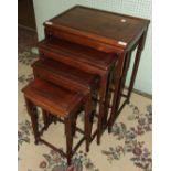 An Oriental hardwood nest of four tables on turned supports, 50 x 36cm, 71cm high.